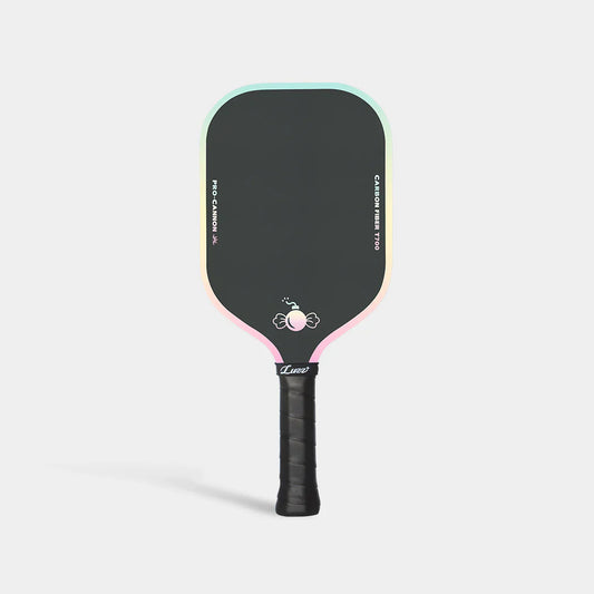 Pickleball paddle with black face, pink and teal rim, upright studio view