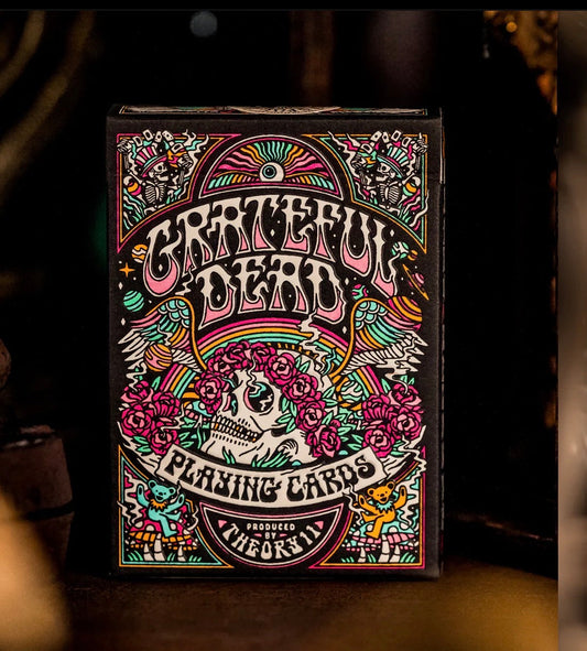 Playing cards box with colorful skull-and-rose artwork and “Playing Cards” text