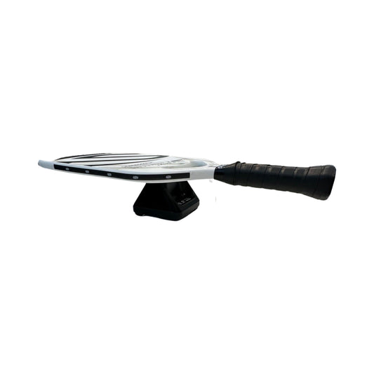 Precision balancing block with black rubber grip and white base plate