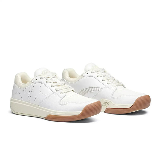Pair of white low-top lace-up pickleball shoes with cream midsoles and brown outsole