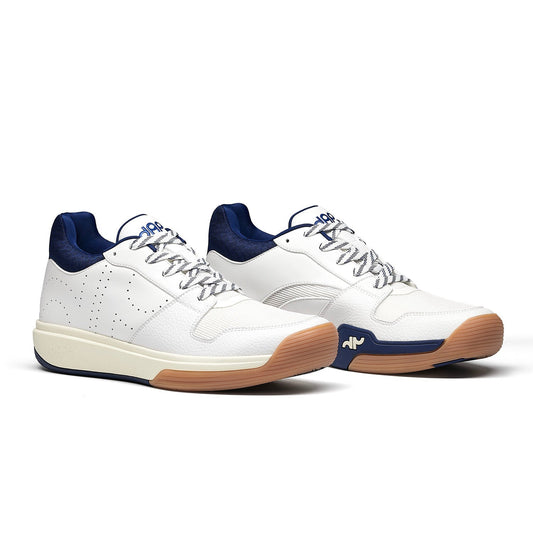 Pair of navy and white mid-top pickleball shoes with lace-up design and tan outsole