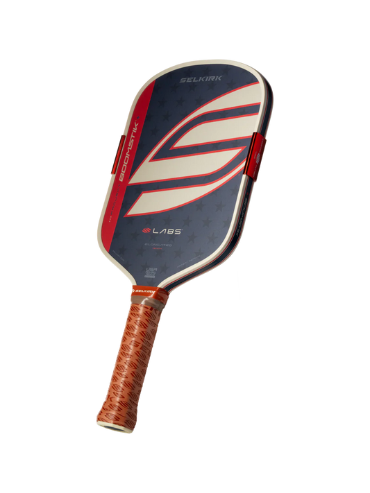 Elongated pickleball paddle, dark blue face with red-and-white stripe graphic