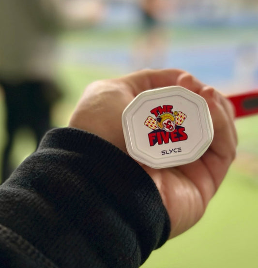 White SpeedCap held in hand with The Fives logo and SLYCE branding