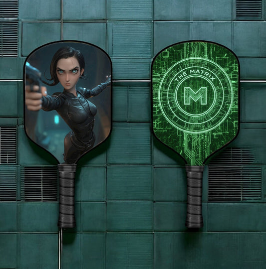 Pickleball paddle set with black and green face designs and long grip handles