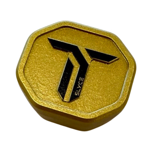 Gold octagonal pickleball paddle SpeedCap with black-and-white SLXS logo
