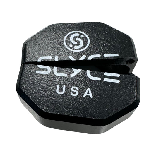Black SLYCE USA cap with circular emblem and SLYCE logo, close-up