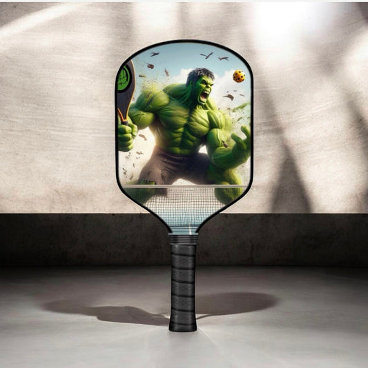 Pickleball paddle with green Hulk action art and dark handle, oval face