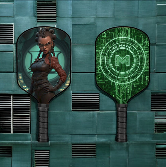 Pickleball paddle with dark graphite face and Matrix-style neon green logo, front view