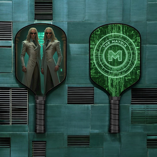 Pickleball paddle, dark green and black Matrix-style design with circular shield emblem
