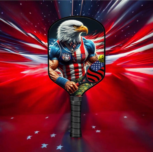 Black pickleball paddle with patriotic eagle graphic and padded grip