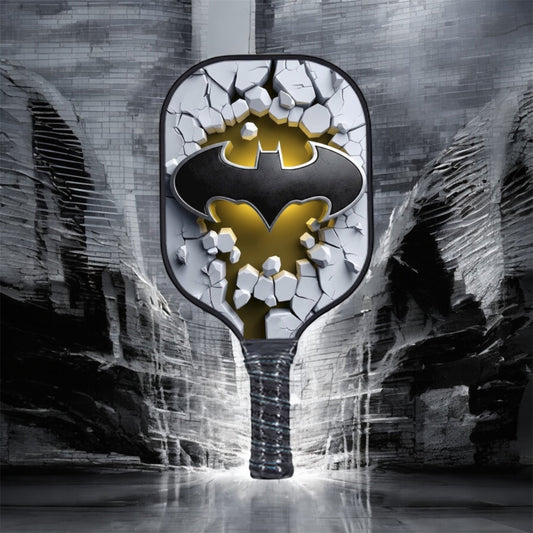 Batman-themed pickleball paddle with black and gold bat emblem head
