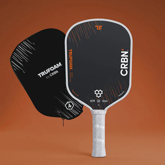 Black CRBN pickleball paddle with white trim and textured grip, full paddle view