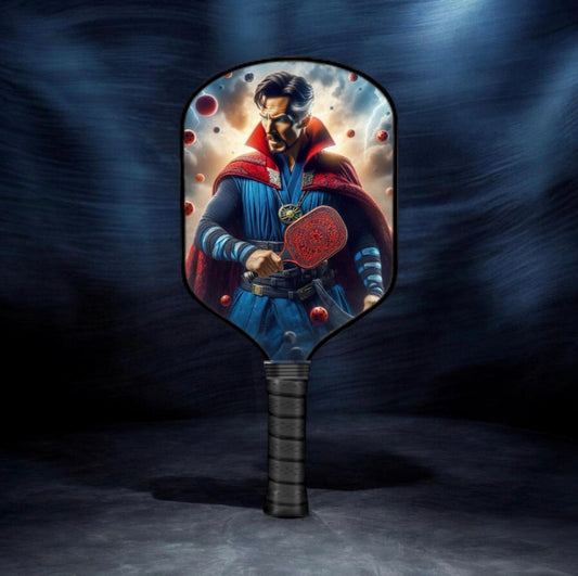 Pickleball paddle with circular graphic face and black textured handle, red/blue