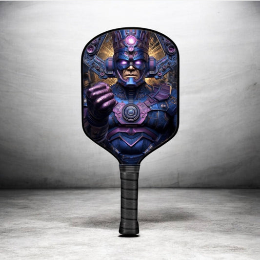 Pickleball paddle with dark graphic face and patterned grip handle