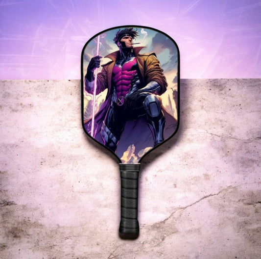 Comics-style pickleball paddle with purple character graphic and black grip