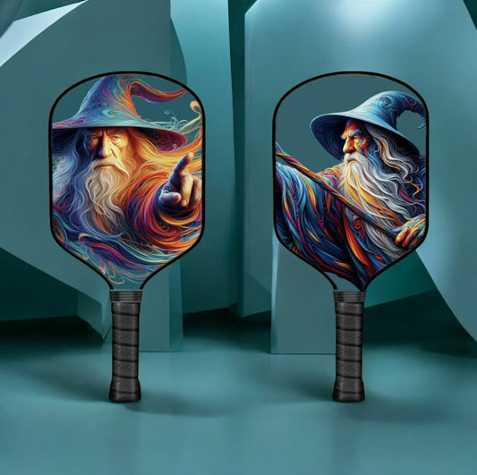 Wizard-themed pickleball paddle with multicolor artwork and dark handle grip
