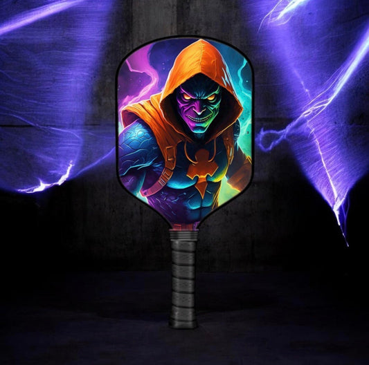 Pickleball paddle with hooded green face graphic and orange accents on round head