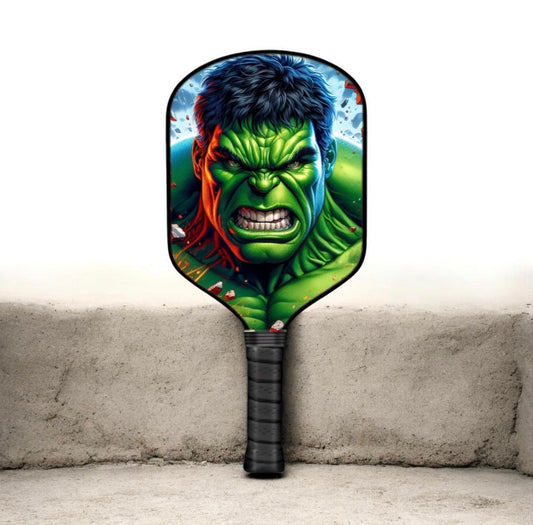 Hulk-themed pickleball paddle with black grip and green monster face on the paddle
