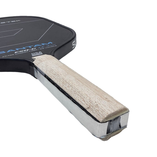 Pickleball paddle anti-vibration grip tape with beige textured pad and black backing