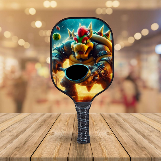 King Bowser-themed pickleball paddle with colorful graphic and grip handle