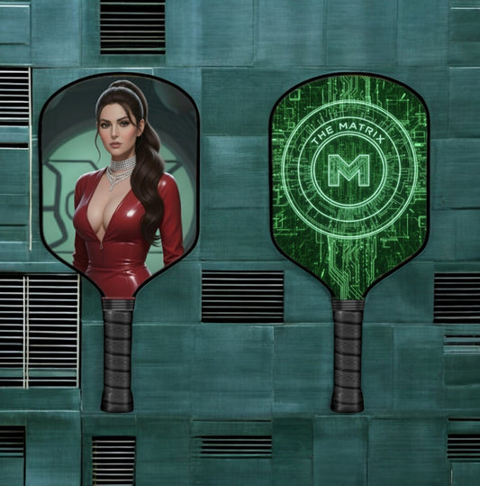 Pickleball paddle with black handle and round face, Matrix emblem and character art
