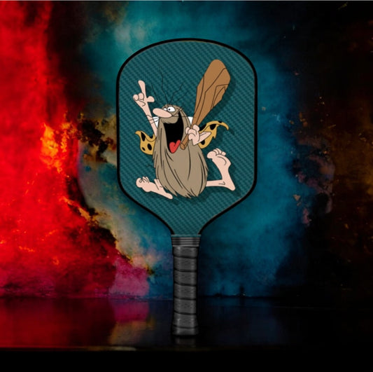Pickleball paddle with dark cartoon emblem on the paddle face and a black handle