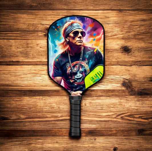 Colorful pickleball paddle with illustrated portrait and dark grip handle