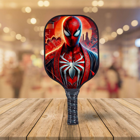 Spiderman-themed pickleball paddle with colorful kimono-style graphic face