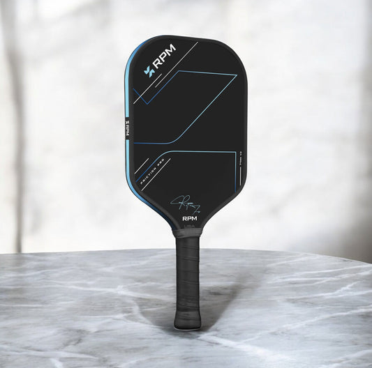 Black elongated pickleball paddle with blue trim and RPM logo, 14mm face