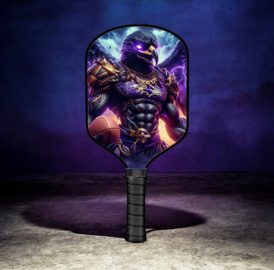 Pickleball paddle with purple fantasy mascot graphic and textured grip handle