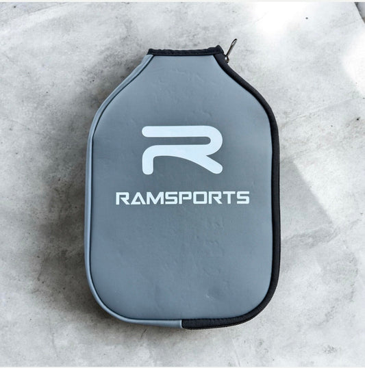 Light blue paddle cover pouch with black trim and RAMSPORTS logo on front