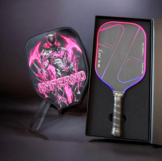 Inferno-themed pickleball paddle with black cover in box, pink rim and blue accents