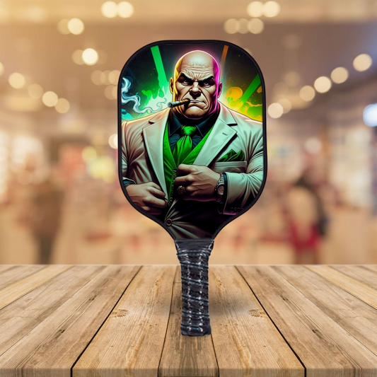 Comics pickleball paddle with green-masked character graphic and textured black grip
