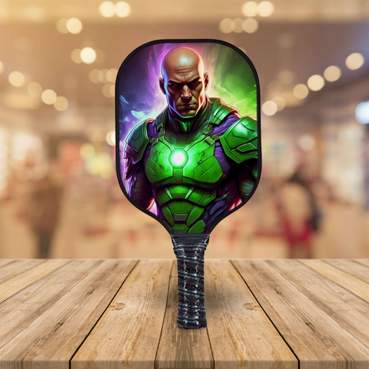Comics-style pickleball paddle with green-and-purple character graphic on black face