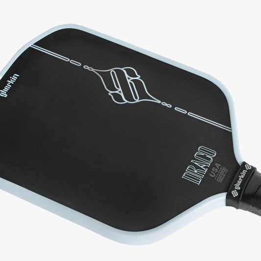Hybrid pickleball paddle face, black with light blue border and Draco graphic