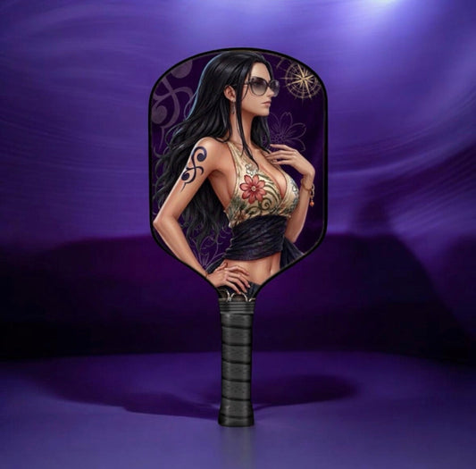 Black pickleball paddle with character artwork and black handle grip
