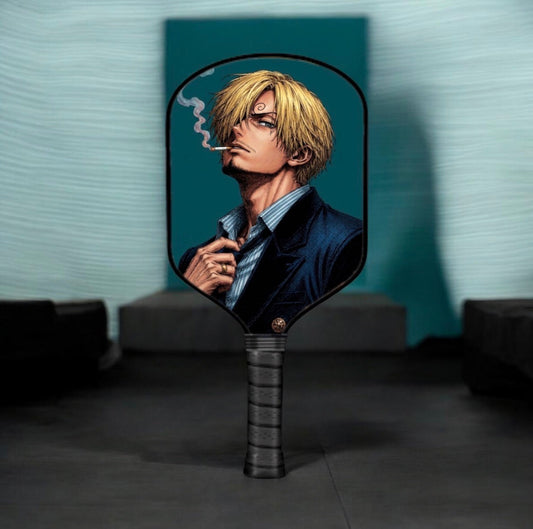 Sanji-themed pickleball paddle with blonde character graphic and dark textured grip handle