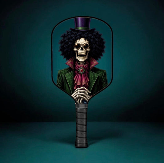 Skull-themed pickleball paddle with black curly hair artwork and purple accents