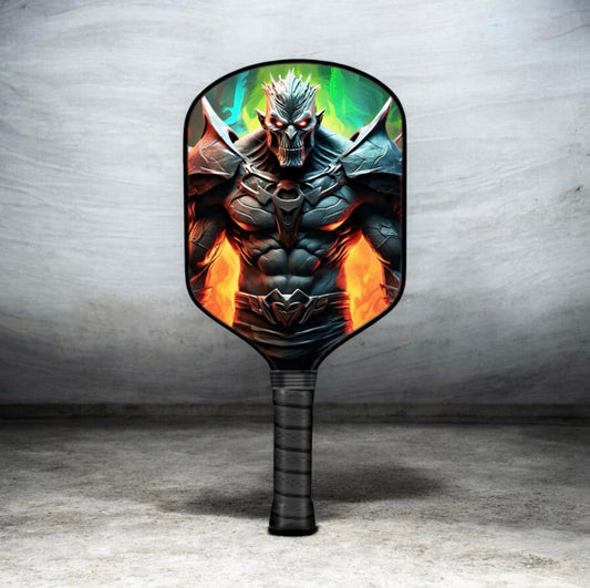 Pickleball paddle with black handle and colorful monster graphic face