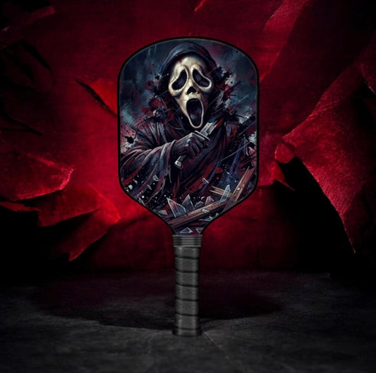 Black pickleball paddle with Ghostface Scream artwork, teardrop face.