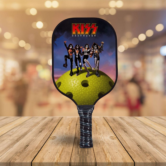 Pickleball paddle with black frame and Kiss design, yellow-green center