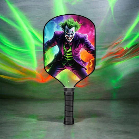 Joker-themed pickleball paddle with black handle and colorful face graphic on paddle face