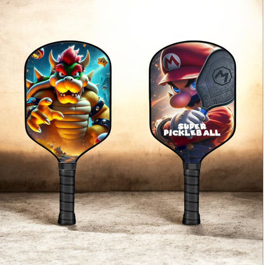 Graphic pickleball paddle pair with King Bowser artwork and textured black handle