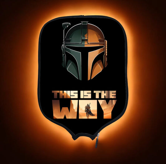 Black pickleball paddle cover with helmet graphic and “This is the Way” print