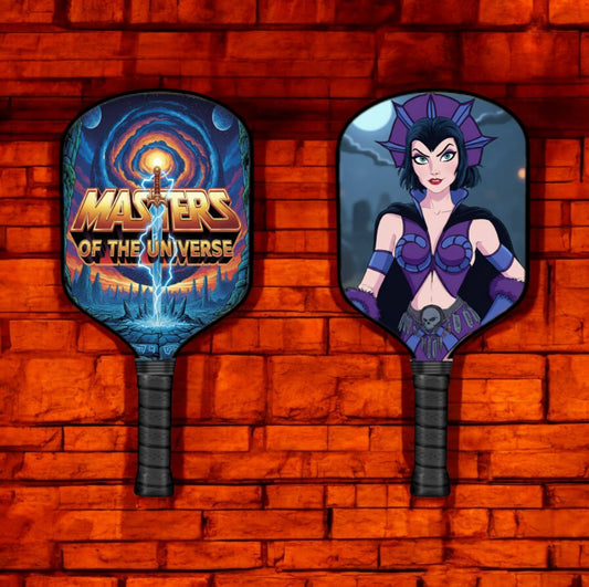 Pair of themed pickleball paddles with round face art and dark handles