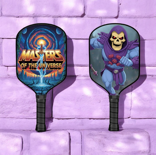 Power Edition pickleball paddle with Skeletor artwork on black paddle face