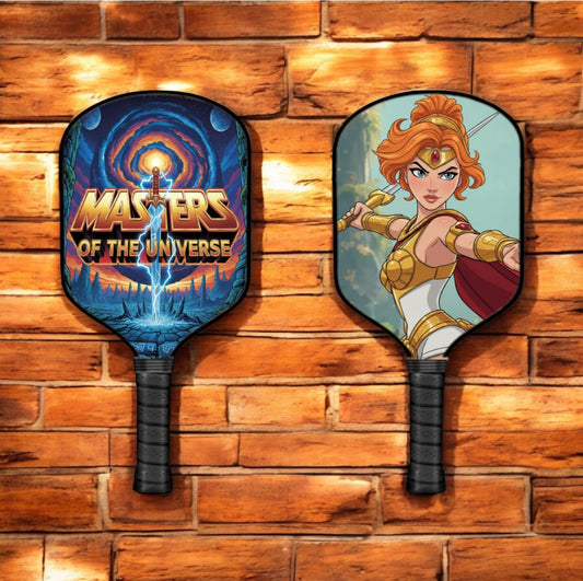 Pickleball paddle with blue character graphic and black grip, round paddle face.