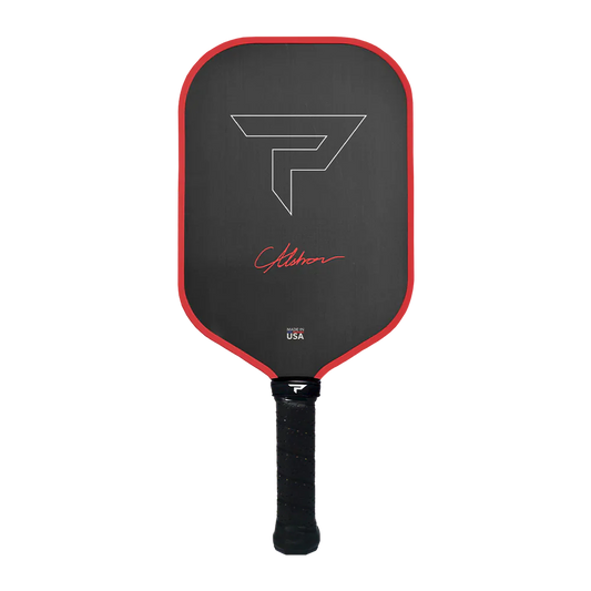 Fire red and black pickleball paddle with geometric logo and branded USA mark