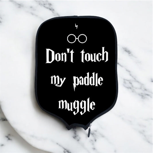 Black paddle cover with 'Don't touch my paddle muggle' and glasses icon