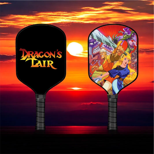 Pickleball paddle with black grip and Dragon's Lair themed face graphic